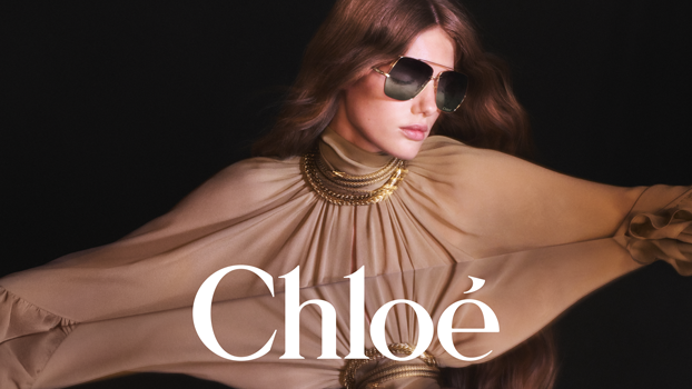 Markenvorstellung Chloé Sonnenbrillen: langhaariges Model trägt eine lockere Bluse und eine Sonnenbrille