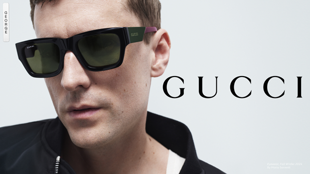 Markenvorstellung Gucci Sonnenbrillen: Model George trägt eine dunkle, eckige Gucci Sonnenbrille 